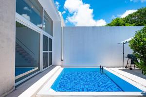 Bazén v ubytování Secret Villas by Relapool nebo v jeho okolí