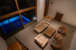 Bazén v ubytování Secret Villas by Relapool nebo v jeho okolí