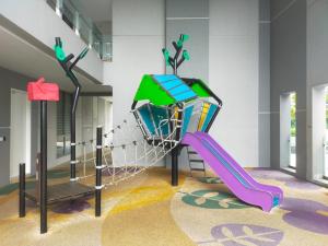 a childrens play area with a slide at Mid Night Realm Kuala Lumpur in Kuala Lumpur
