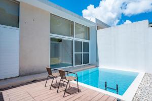 Bazén v ubytování Secret Villas by Relapool nebo v jeho okolí