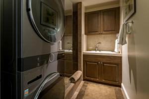 a small bathroom with a sink and a mirror at East 5th St. 111 - 1 in Ketchum +25 photos