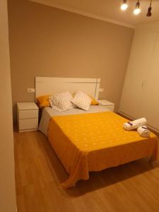 Ένα ή περισσότερα κρεβάτια σε δωμάτιο στο Apartamento El Cortijo