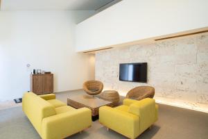 TV a/nebo společenská místnost v ubytování Secret Villas by Relapool