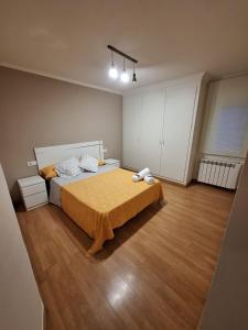 Ένα ή περισσότερα κρεβάτια σε δωμάτιο στο Apartamento El Cortijo