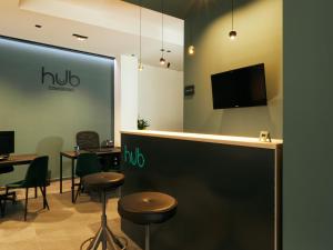 TV a/nebo společenská místnost v ubytování HUB Rooms