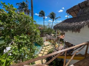 a view of a resort with a swimming pool at DuMangue Kite House in Guriú