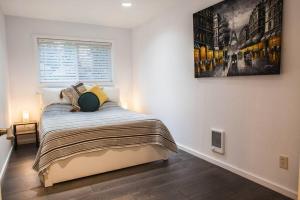 Voodi või voodid majutusasutuse Relax & Enjoy This Spacious Gem In Easy Location toas