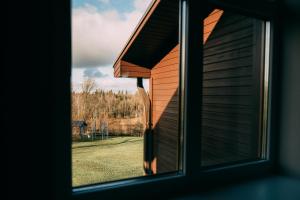 Fotografie z fotogalerie ubytování Weavers' Guest House Kalndaki v destinaci Milzkalne