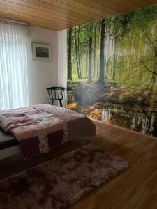 Postel nebo postele na pokoji v ubytování Schieferstübchen Winterberg Ferienwohnung für 10 Personen
