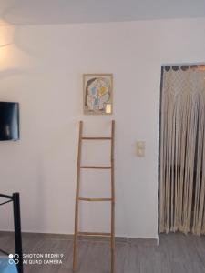 TV a/nebo společenská místnost v ubytování Stamatis Rooms