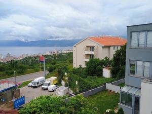 a view of cars parked in a parking lot at Moon Light-free parking in Rijeka
