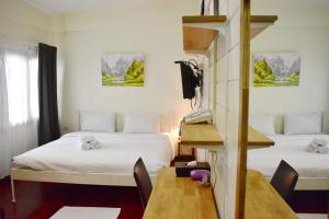 Letto o letti in una camera di Greenery Hostel