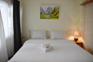 Letto o letti in una camera di Greenery Hostel