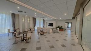 TV a/nebo společenská místnost v ubytování Hotel Le Cerbaie