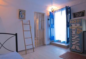 Postel nebo postele na pokoji v ubytování Stamatis Rooms