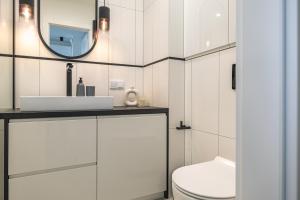 Kúpeľňa v ubytovaní Apartamenty Central Gdańsk Q4Apartments