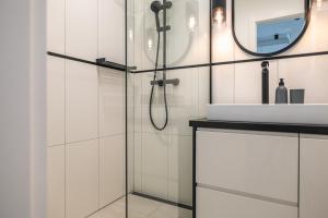 Kúpeľňa v ubytovaní Apartamenty Central Gdańsk Q4Apartments + 7 fotografií