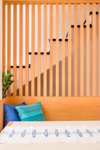 Postel nebo postele na pokoji v ubytování Il Ciasso Romantic Seafront Escape