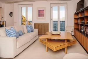 A seating area at Carattino 12 Idyllic Seafront Retreat