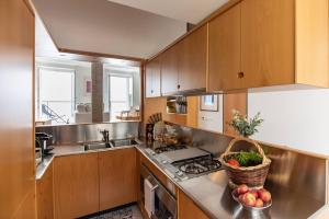 A kitchen or kitchenette at Carattino 12 Idyllic Seafront Retreat