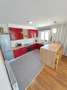 Kuchyň nebo kuchyňský kout v ubytování Holiday House Meri