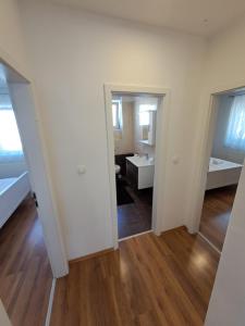 Postel nebo postele na pokoji v ubytování Holiday House Meri