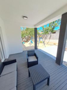 Posezení v ubytování Holiday House Meri