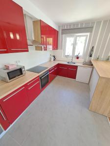 Kuchyň nebo kuchyňský kout v ubytování Holiday House Meri