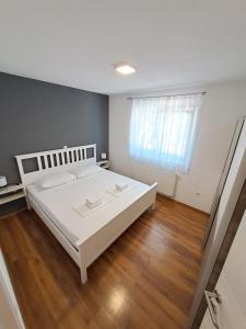 Postel nebo postele na pokoji v ubytování Holiday House Meri