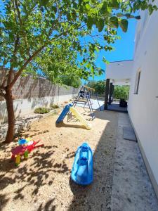Herní místnost nebo prostor pro děti v ubytování Holiday House Meri