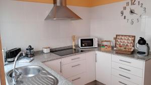 Kuchyň nebo kuchyňský kout v ubytování Casa Cortegada + 34 fotografií