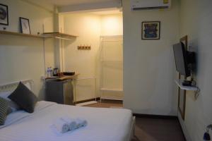 Letto o letti in una camera di Greenery Hostel