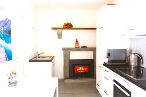 Una cocina o zona de cocina en Rustico in pietra