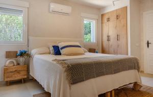 Ένα ή περισσότερα κρεβάτια σε δωμάτιο στο Xenofilia 6