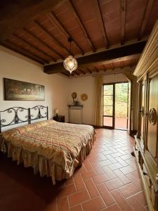 Ένα ή περισσότερα κρεβάτια σε δωμάτιο στο Agriturismo Fattoria Sant'Appiano +108 φωτογραφίες