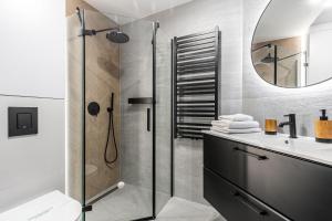 Kúpeľňa v ubytovaní Apartamenty Tatra View Kościelisko