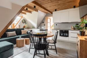 Kuchyňa alebo kuchynka v ubytovaní Apartamenty Tatra View Kościelisko