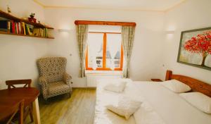 Postel nebo postele na pokoji v ubytování Stylový vesnický apartmán v soukromí M. Skála Český Ráj