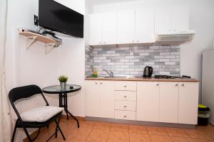 Kuchyň nebo kuchyňský kout v ubytování Apartment Josipa