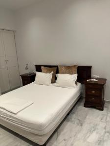Posteľ alebo postele v izbe v ubytovaní Palace Apartment