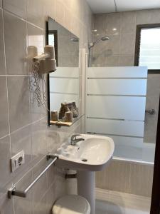 Koupelna v ubytování Hotel Sancho III