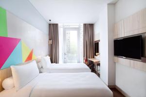 Voodi või voodid majutusasutuse Ibis Styles Jakarta Sunter toas