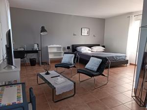 Postel nebo postele na pokoji v ubytování Bastide De Luzert