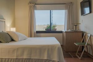 Letto o letti in una camera di Alma Drabble