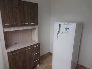 Kuchyň nebo kuchyňský kout v ubytování Fazenda Cantinho - chalé 2 qts reformado + 6 fotografií