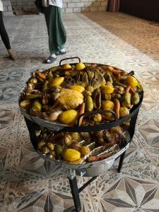 a large grill filled with different types of food at Royal Dunes Camp in Wadi Rum +58 photos