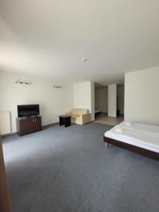 Łóżko lub łóżka w pokoju w obiekcie Artel Villa Tarsis