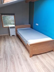 Postel nebo postele na pokoji v ubytování vakantiehuis en appartement De Harscamp
