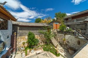 Fotografie z fotogalerie ubytování 凹园小院 v destinaci Li-ťiang