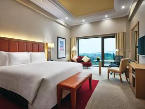 Ένα ή περισσότερα κρεβάτια σε δωμάτιο στο InterContinental Shenzhen by IHG